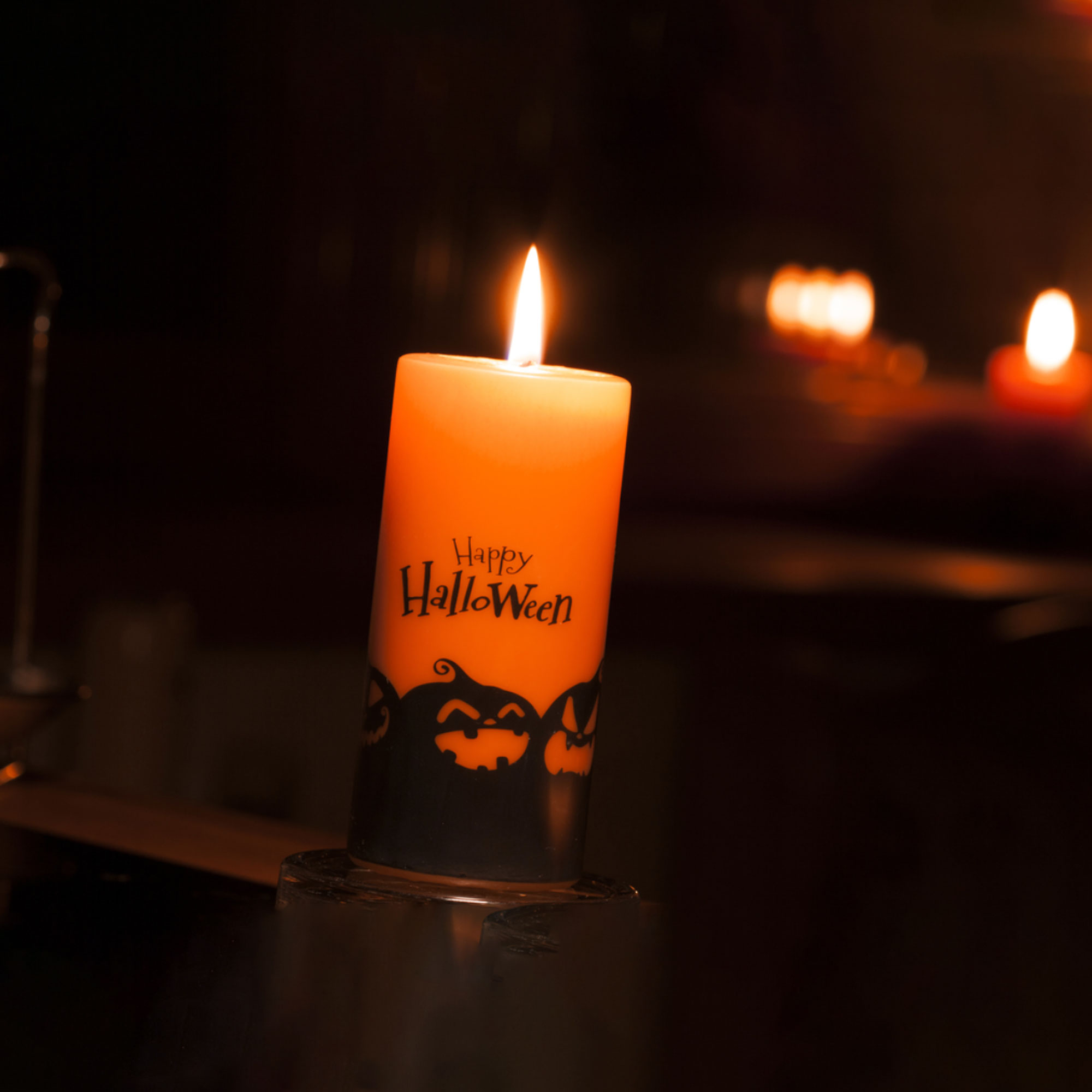 Happy Halloween Kerze mit gruseligen Kürbisen
